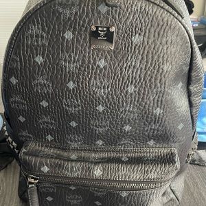 I’m selling this MCM large backpack only been worn about a hood 7 times .